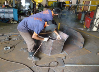 Welding a fabricated chute