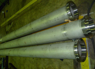 Finished machined rollers and shafts in the workshop