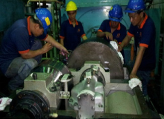 Four Major Engineering technicians overhauling a large pump